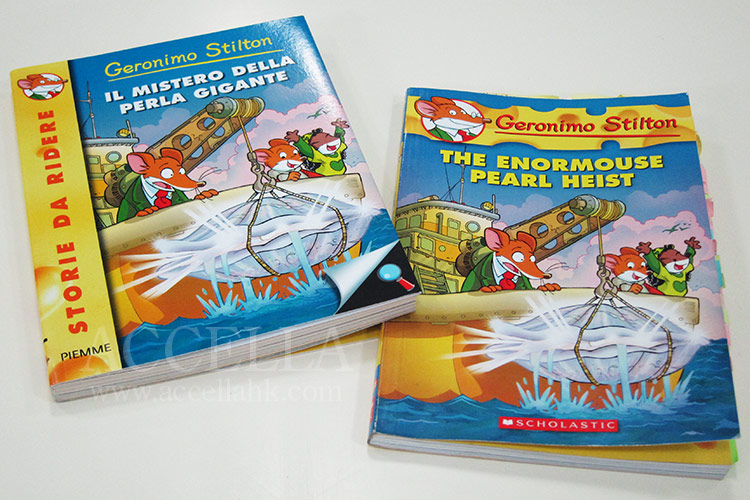 The original Italian edition of 'The Enormouse Pearl Heist' at left and the English translation at right.